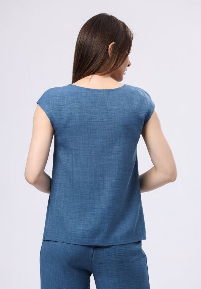 Легка синя блуза з віскозної тканини жатка 1304с